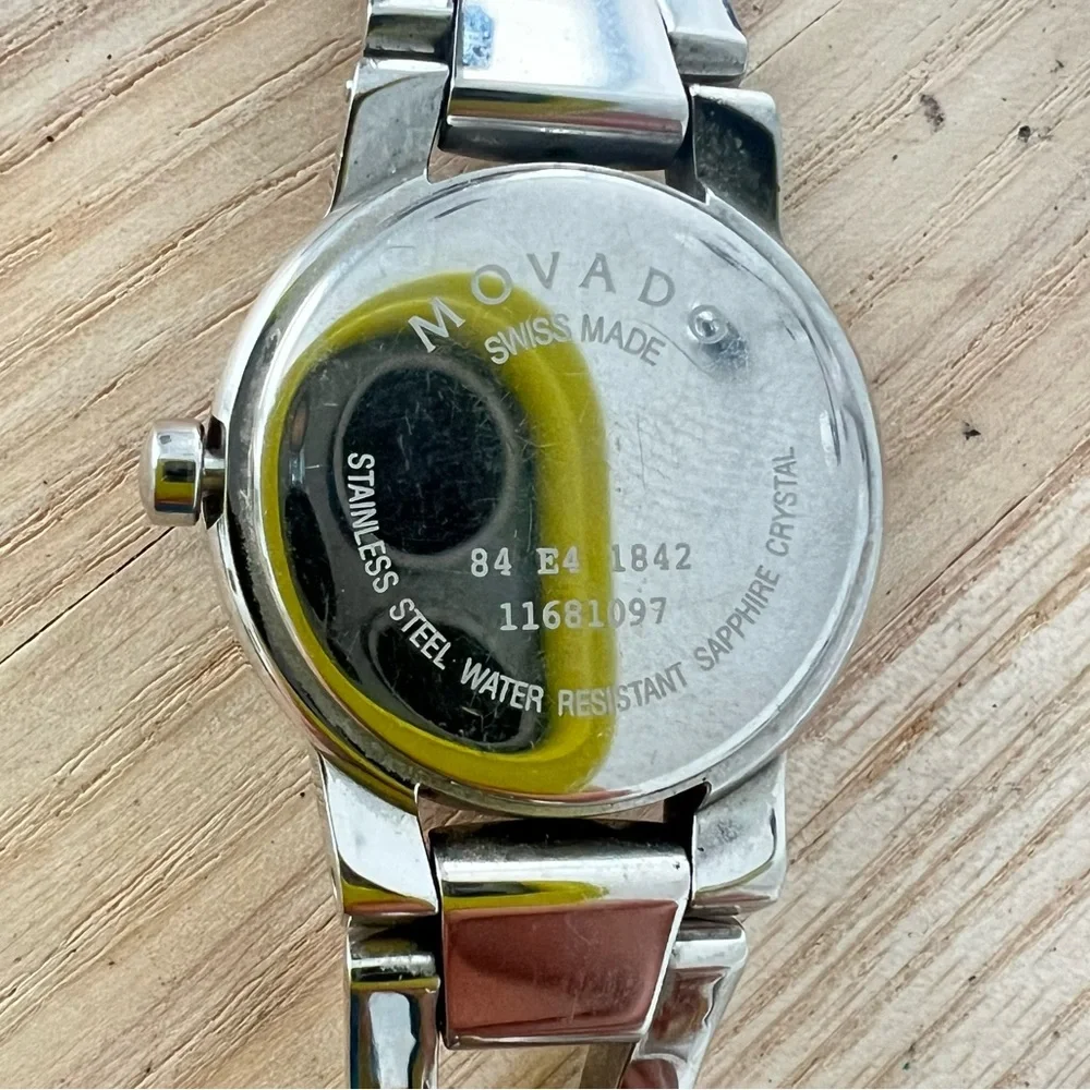Movado Swiss Made ladies black dial stainless steel minimalist watch NEW BATTERY